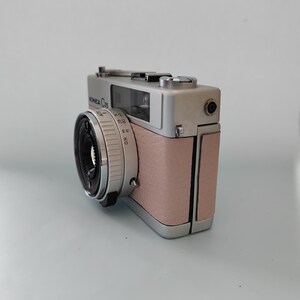 Konica C35 Rangefinder Film Camera | Refurbished & Tested in Japan | Kodak Film Included | Hexanon 38mm Lens | Pale Pink Leather image 3