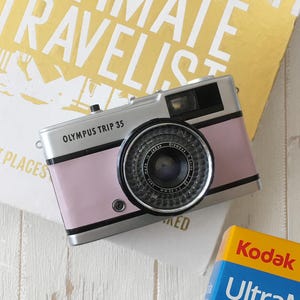 Refurbished Olympus Trip 35 Film Camera: Lilac Leather, Kodak Film, 1-Yr Warranty