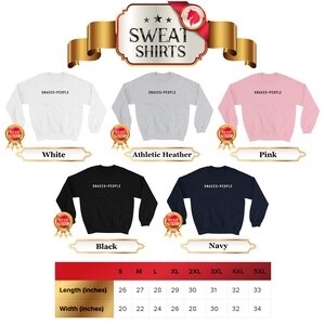 May include: A size chart for sweatshirts in white, athletic heather, pink, black, and navy. The chart shows the length and width in inches for sizes S through 5XL. The text "Snakes People" appears on each sweatshirt.