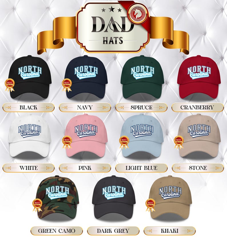 May include: A selection of "Dad Hats" in a variety of colours, each displaying "North Carolina" in a curved, white font. Colours include black, navy, spruce, cranberry, white, pink, light blue, stone, green camo, dark grey, and khaki.