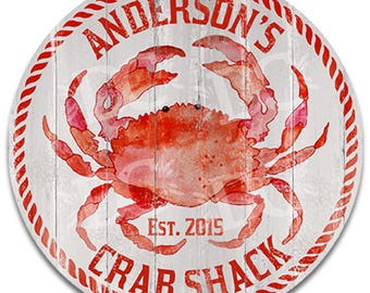 Metalowy szyld „Crab Shack”: wystrój restauracji z owocami morza w stylu marynistycznym