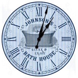 May include: A blue and white clock with Roman numerals and a bathtub design. The clock face says "Johnson's Bath House Relax & Enjoy".