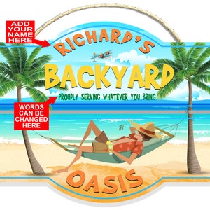 May include: A wooden sign with a blue and yellow tropical beach scene. The sign reads "Richard's Backyard" and "Proudly Serving Whatever You Bring". The bottom part of the sign reads "Oasis" and features a cartoon of a person relaxing in a hammock.