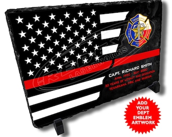 May include: Black and white American flag with a red stripe across the middle. The flag is on a black slate plaque with a gold firefighter emblem and the text "Texarkana Fire Dept." The plaque also includes the text "Capt. Richard Smith, April 1990 - Sept 2020, 30 Years of Loyalty and Dedication, Texarkana Fire and Rescue".