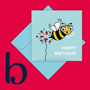 May include: A blue birthday card with a cartoon bee flying away from a red flower with the text "Oh no!" and "Happy Birthday".