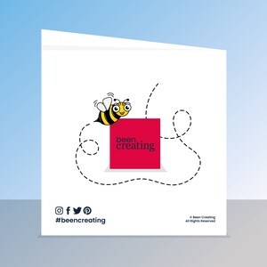 May include: A white card with a red square that says "been creating" and a cartoon bee flying towards it. The bee is yellow and black with white eyes. The card also has social media icons and the hashtag #beencreating.