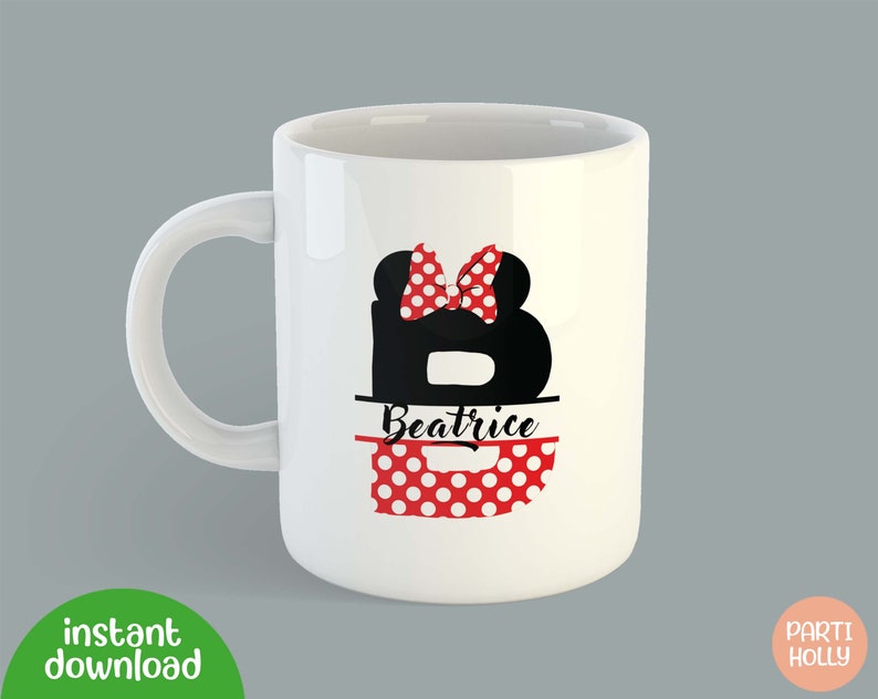 May include: White ceramic mug with a black letter B with red polka dots and a red bow. The name Beatrice is written below the letter.