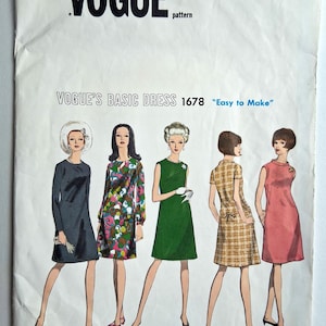 May include: Vintage Vogue pattern envelope with illustrations of five dresses. The dresses are in dark grey, floral, green, plaid, and pink. The text reads "Vogue's Basic Dress 1678 'Easy to Make'". The Vogue logo is at the top.