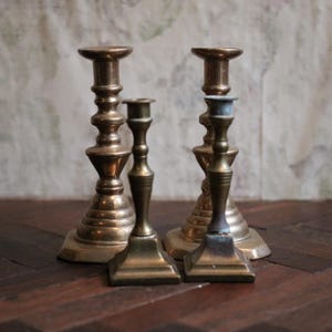 4 Small Antique Brass Candlesticks