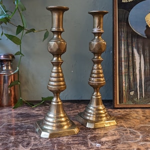 Pair of Antique Brass Column Candlesticks With Ejectors