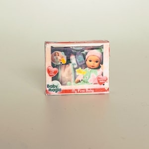 Miniature Baby Magic Doll Package