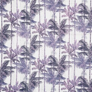 May include: A white textile featuring a repeating pattern of stylized palm trees in shades of purple and blue. The design includes vertical lines of stitching, adding texture to the fabric. The overall aesthetic is tropical and decorative.