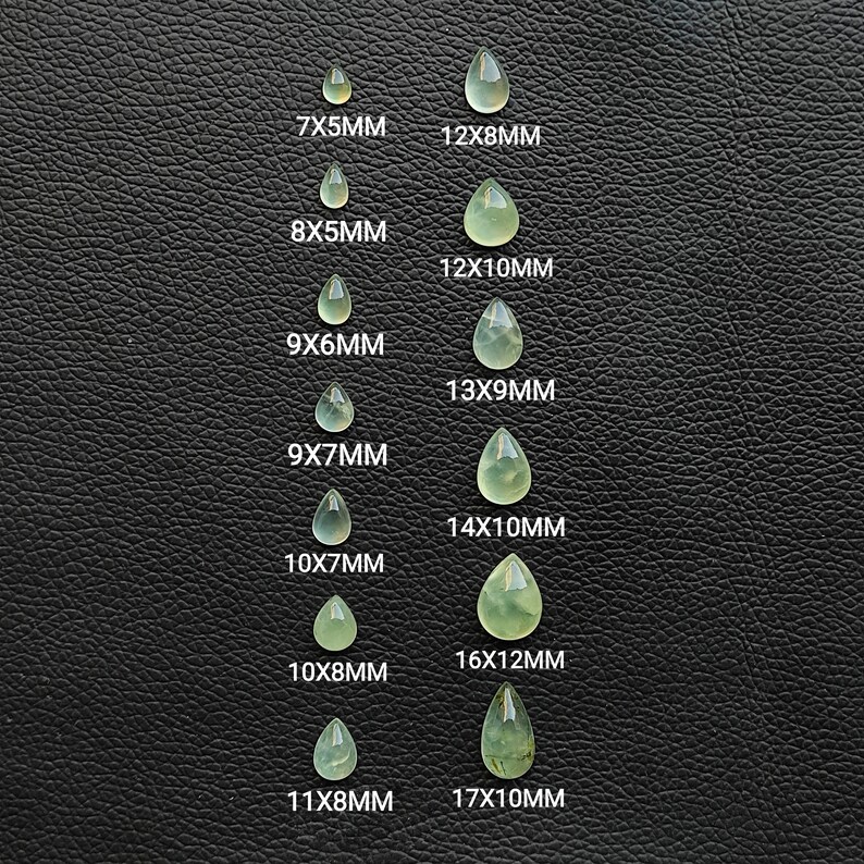 May include: A set of 10 teardrop-shaped green gemstones of varying sizes, arranged in two columns. The gemstones are labeled with their dimensions in millimeters, ranging from 7x5mm to 17x10mm.