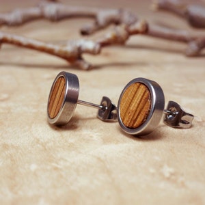 Men's walnut wood studs in a skin-friendly stainless steel base, perfect for daily wear.