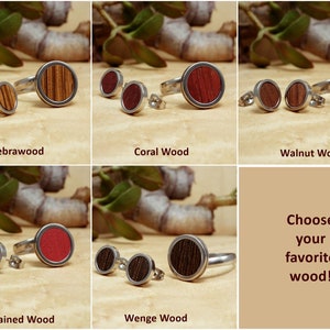 May include: Set of wooden earrings and a ring in various wood types, including zebrawood, coral wood, walnut wood, red stained wood, and wenge wood. Choose your favorite wood!