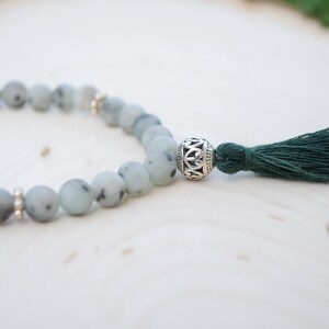 Soothing Mala Stretch Bracelet made with Kiwi Jasper beads. Tassel Bracelet. Yoga Jewelry.