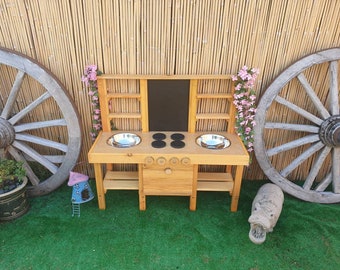 Cucina in fango con forno a scomparsa