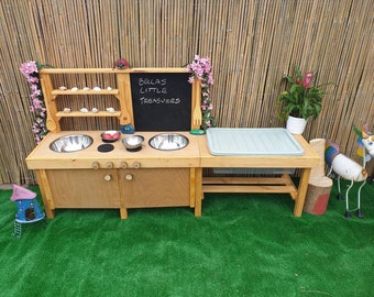 Mud kitchen with blackboard and water/sand table