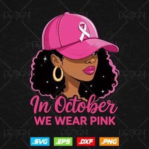 May include: Illustration of a woman wearing a pink baseball cap with a white ribbon, and gold hoop earrings. The text "In October We Wear Pink" is displayed in pink. The image is on a black background.