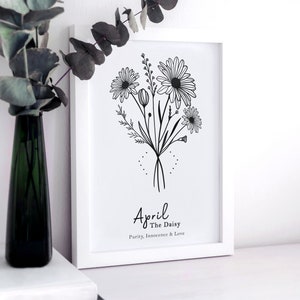 May include: Black and white line art print of a bouquet of daisies with the text "April The Daisy Purity, Innocence & Love"