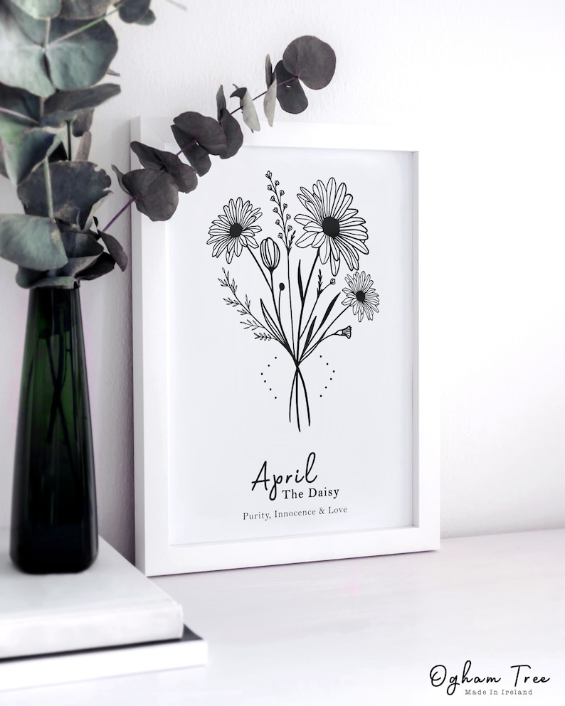 May include: Black and white line art print of a bouquet of daisies with the text "April The Daisy Purity, Innocence & Love"