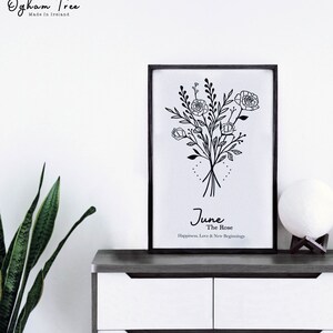May include: Black and white line art print of a bouquet of roses with the text "June The Rose Happiness, Love & New Beginnings".