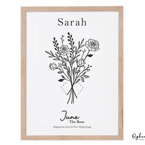 May include: A printable art print with a black and white illustration of a bouquet of roses. The text "Sarah" is at the top of the print. The text "June, The Rose, Happiness, Love & New Beginnings" is at the bottom of the print. The text "Ogham Tree, Made In Ireland" is in the bottom right corner of the print.