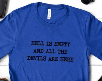 May include: A royal blue t-shirt with the text "Hell is empty and all the devils are here" printed in black.