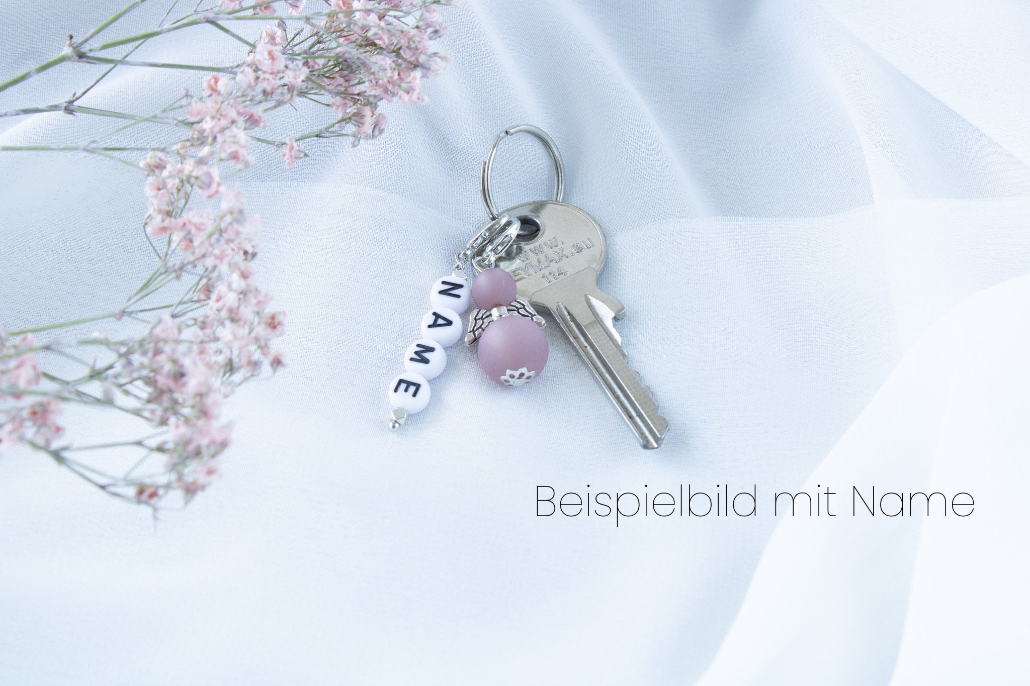 Porta chiavi Charm con corda, campanello e moschettone Basilico Pelle