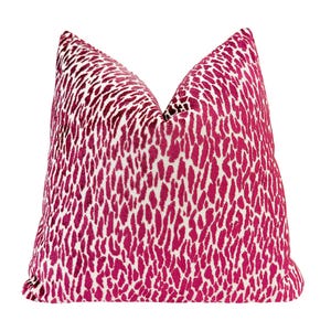 May include: A square throw pillow featuring a vibrant magenta and white animal print pattern. The fabric displays a dense, repeating organic spot design across the entire surface, with a soft texture and a classic knife-edge finish on all sides.