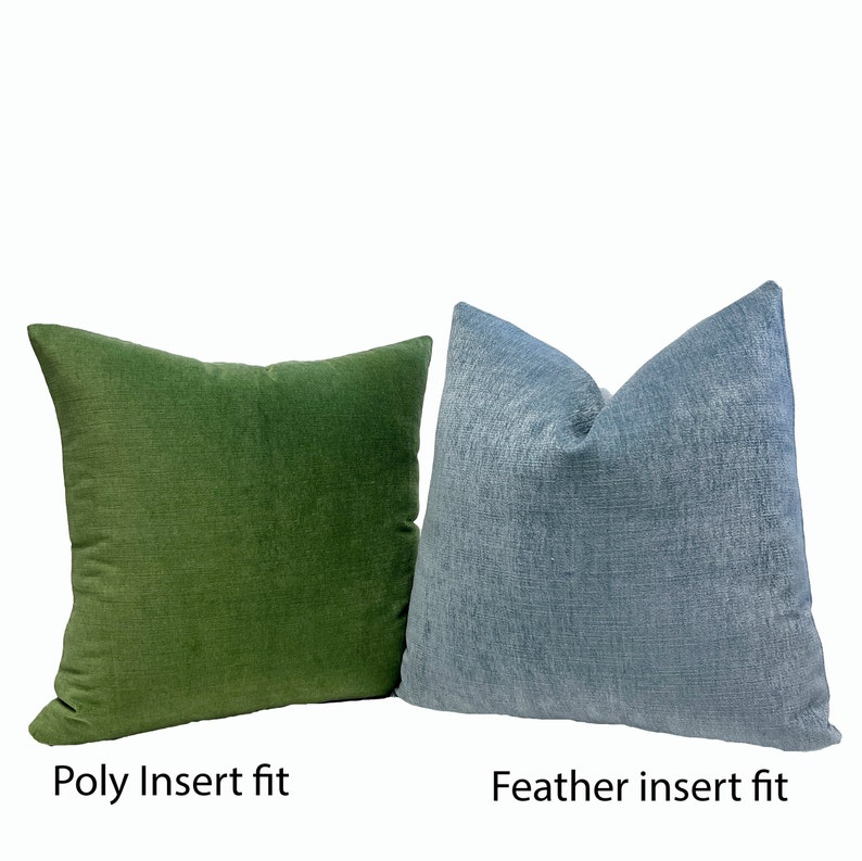 May include: Two decorative throw pillows. One is a solid green, the other is a light blue. The green pillow has the text "Poly Insert fit" below it. The blue pillow has the text "Feather insert fit" below it. Both pillows have a textured appearance.