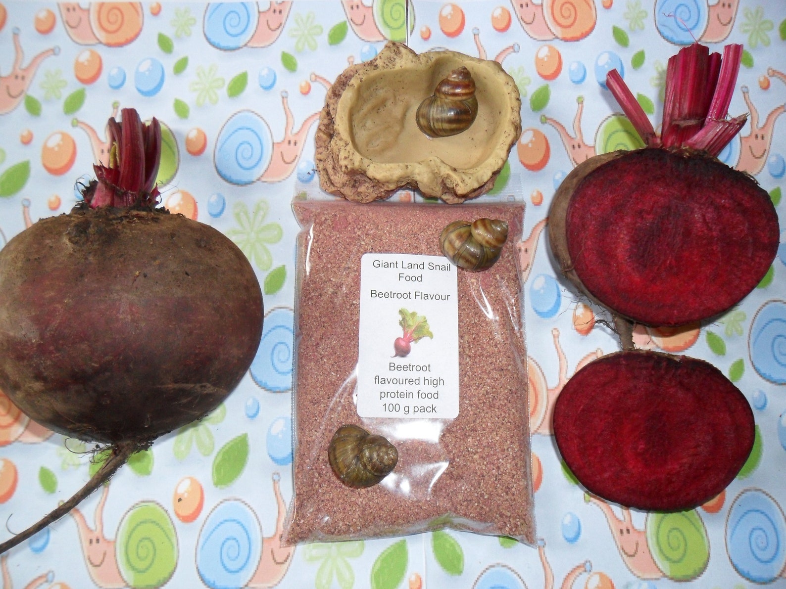 thumbnail image 2 of Land Snail Food Snout & Shell - High-Protein Calcium Blend With Fruits (Resealable Pouch) Calcium For Garden Snails 2 of 11