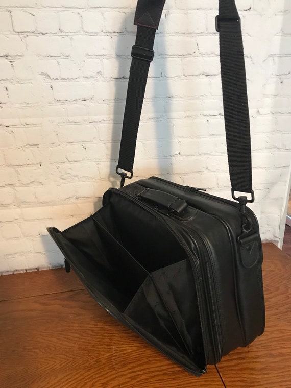Targus black leather travel overnight bag/ suitcas