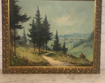 Josef de Groot signed oil on canvas mountain landscape framed in a floral gold gilt ..23W x 19 H
