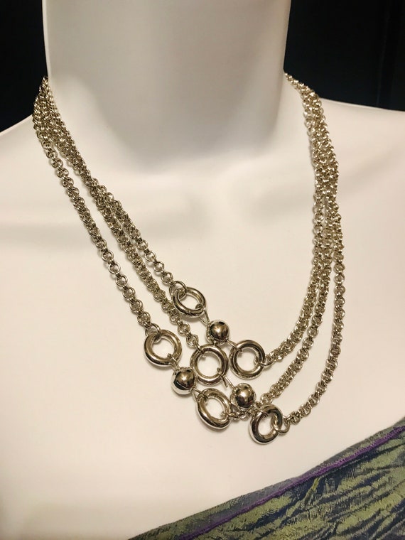 Coro opera length silver tone designer necklace