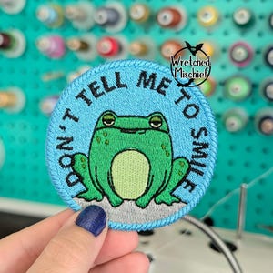 Don't Tell Me To Smile Frog Patch: Funny Embroidered Sew-On Patch