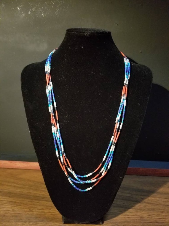 Multi strand heishi necklace of turquoise,  lapis,