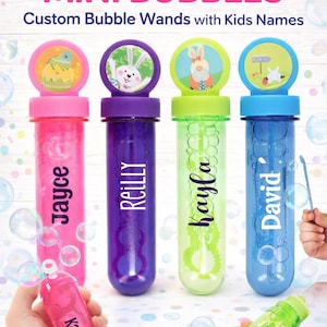 May include: Personalized mini bubble wands in pink, purple, green, and blue, each with a different animal-themed top. The names "Jayce", "Reilly", "Kayla", and "David" are printed on the wands. The image also shows a bubble wand with the name "Kar.ce" and "Kayla".