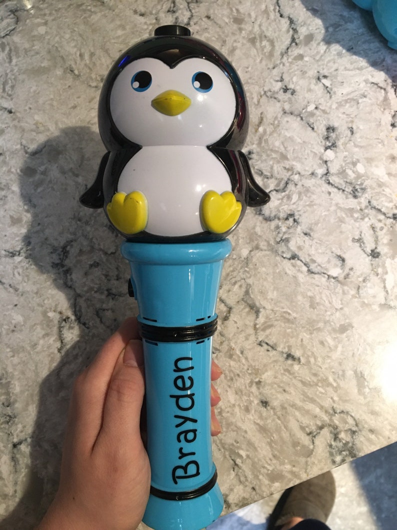 Hand held penguin bubble machine with name on it | Etsy