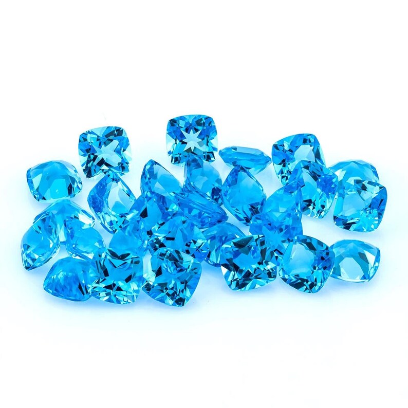 Swiss Blue Topaz 30.33 CT 6X6 MM Cushion.