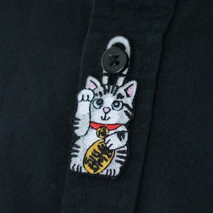 Gancio per bottoni Maneki Neko