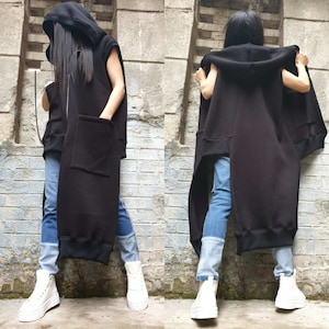 Neue Kollektion Gothic Weste/Ärmelloser Asymmetrischer Mantel/Frauen Maxi Weste/Lange Kurze Kapuzenweste/Extravagante Weste/Kleidung in Übergröße/Schwarze Weste