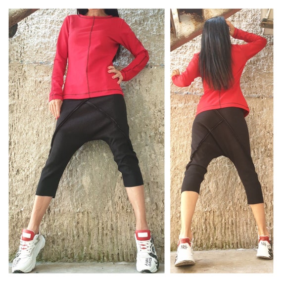 red blouse with black pants