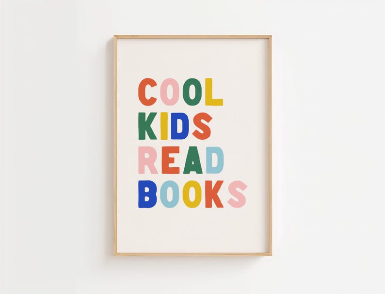 May include: A framed print with the text "COOL KIDS READ BOOKS" in colorful letters. The letters are in different colors, including red, green, blue, yellow, and pink.