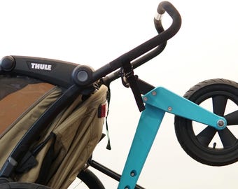 Universal balance bike mount for strollers | compatible with Croozer, Qeridoo and Cube