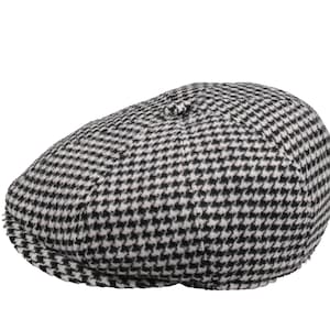 May include: A black and white checked newsboy cap.