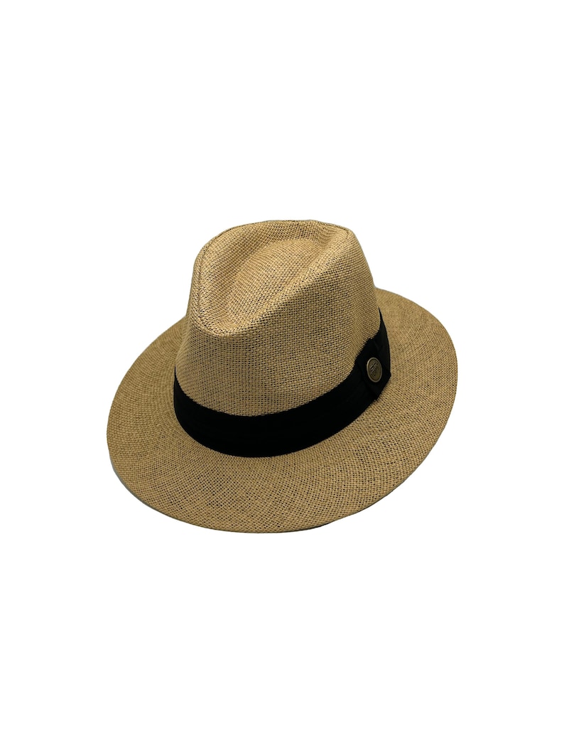 May include: A tan straw fedora hat with a black ribbon and a small brass button.