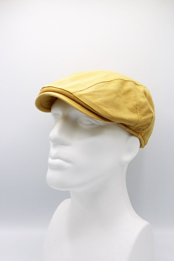 Yellow hotsell newsboy cap