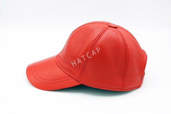 red leather baseball cap