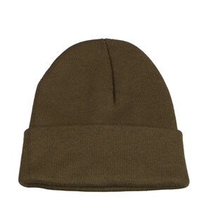 May include: A brown knitted beanie hat.